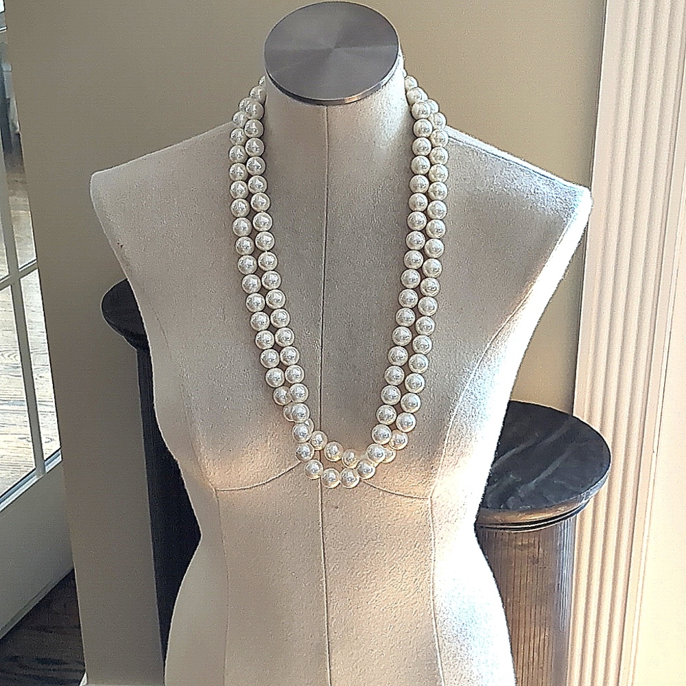 20mm round, white artificial pear strand.  Two strands shown and sold as one.